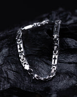 Redefined Cross Charm Bracelet